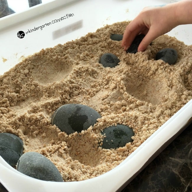 Grab some stones and this easy recipe for moon sand for a great activity to play and learn with your kids! Work on patterning, sorting, and more!