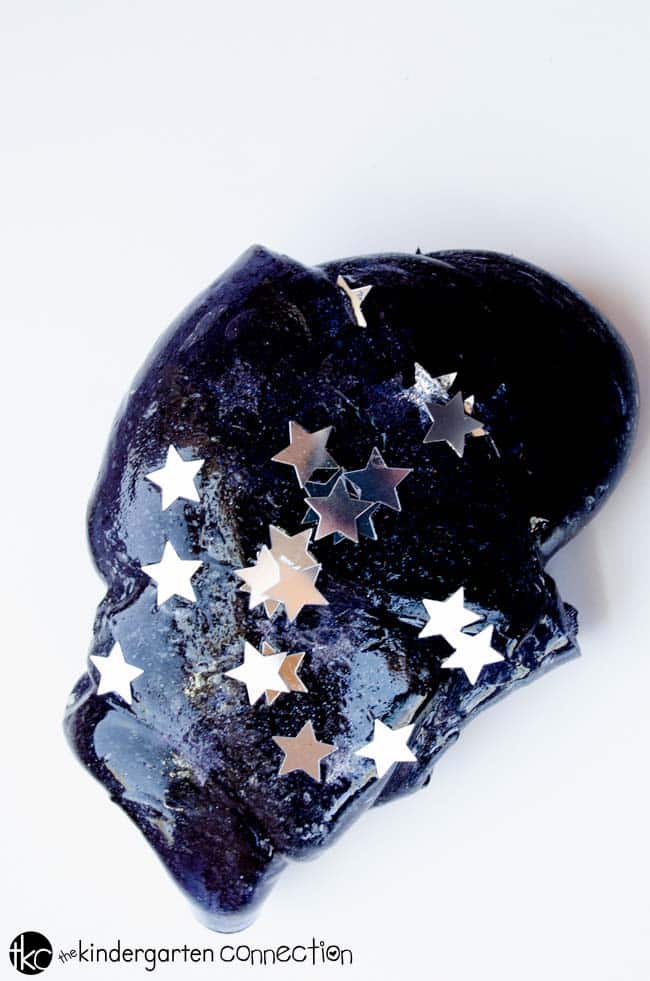 Starry night sky slime is a the perfect sensory activity for a space unit, or just for fun! Easy to make yourself at home or school for fun sensory play.