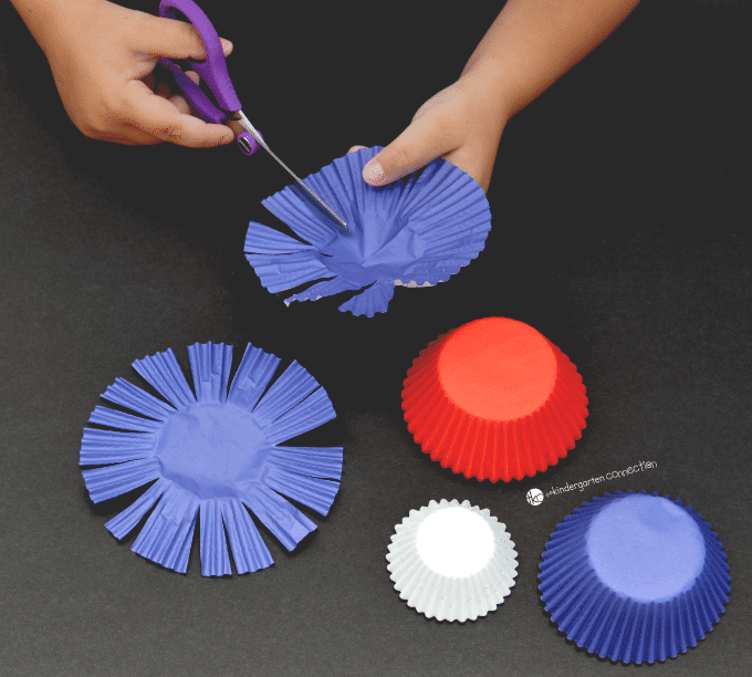 This Cupcake Liner Fireworks Craft is a fun, patriotic craft for kids to make in celebration of Independence Day. Plus, it builds up scissor skills too!