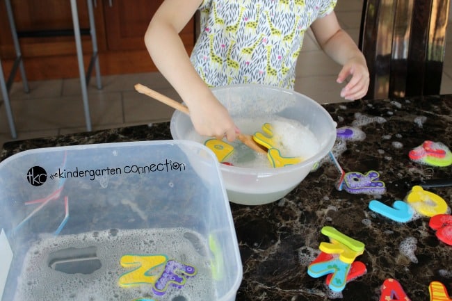 What a fun alphabet sensory bin for preschoolers and kindergarteners! Blow bubbles and have hands on fun with letters and sounds.