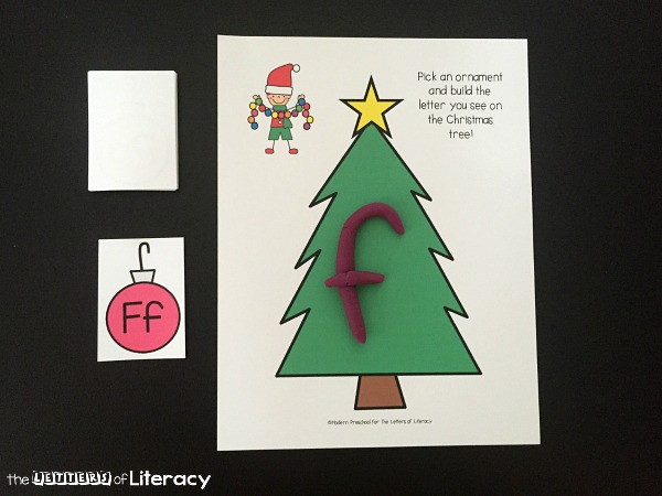 This holiday season, use engaging Christmas printable activities like our free Christmas Alphabet Play Dough Mats activity.