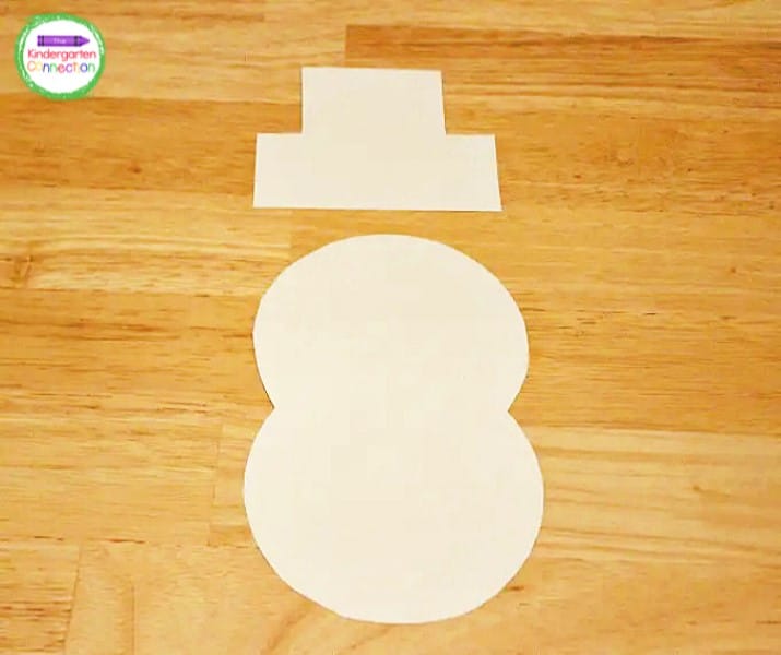 Cut out the snowman body and top hat.