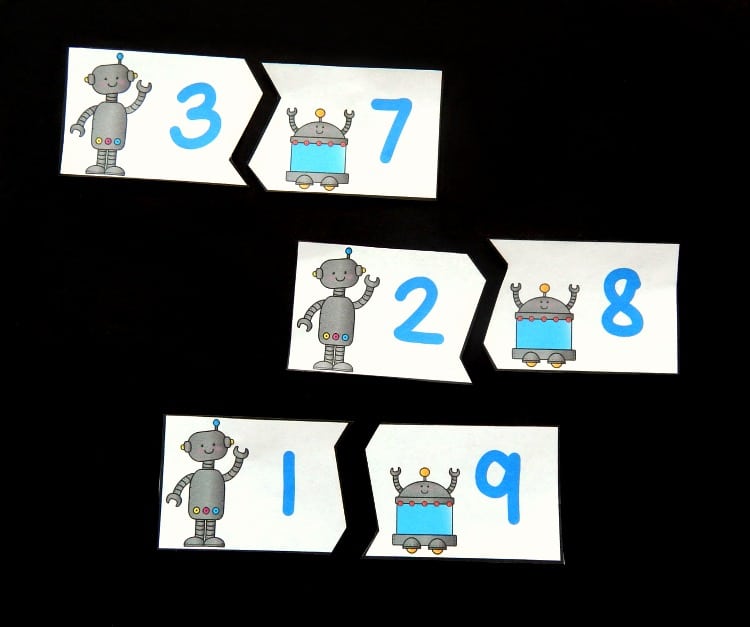 Make learning sums of 10 super fun with these engaging free printable robot sums of 10 puzzles! They are a great addition math center for kids!