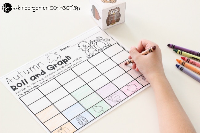 This free Fall Roll and Graph Math Activity is perfect for math centers or partner work in Pre-K and Kindergarten! Children will enjoy rolling a die to race to the top of the graph to see who the winner is!