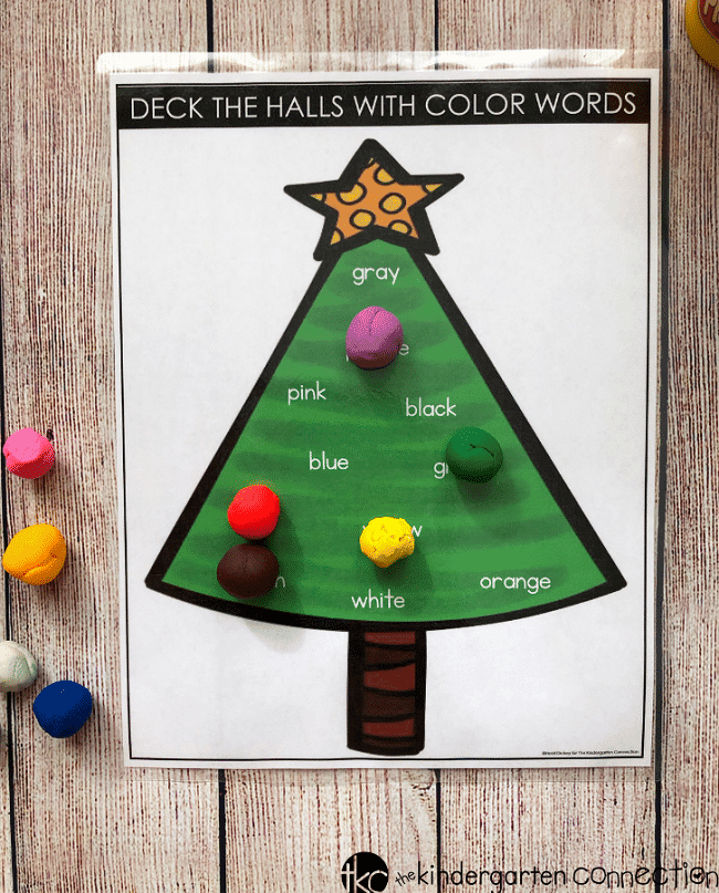 Kids will be so excited about this free Christmas Color Words Activity for Kindergarten! It combines learning with a kid's love of play dough and is a fun, festive activity for small groups or centers during the holiday season!