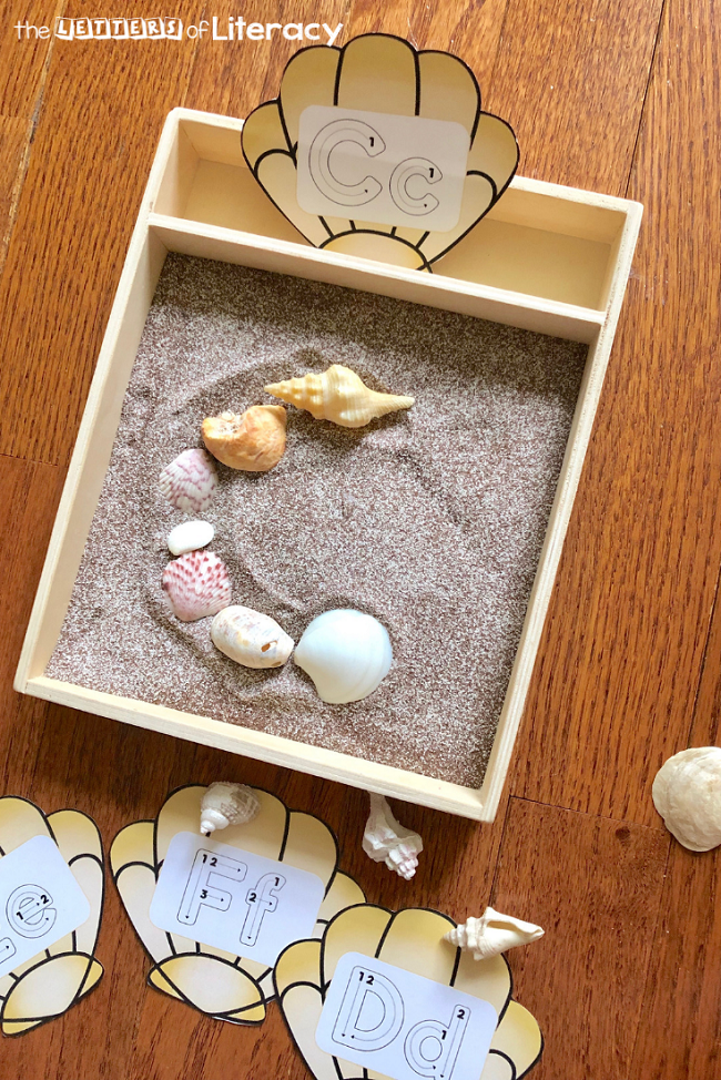 Grab our FREE Seashell Alphabet Printables for this fun Sensory Writing Tray Activity! It's perfect for your literacy OR writing center in your kindergarten classroom! 