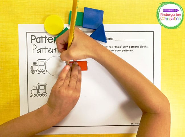 Begin by lining up the blocks and tracing the shapes in any pattern that you choose.