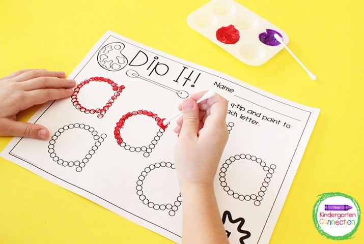 On the Dip It printable, students practice fine motor skills by using q-tips and paint to color in each letter.