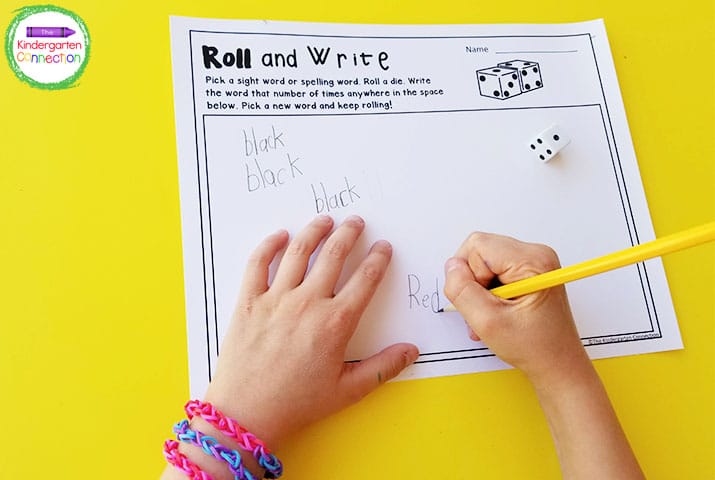 In Roll and Write, students roll the dice and write a word the designated number of times.