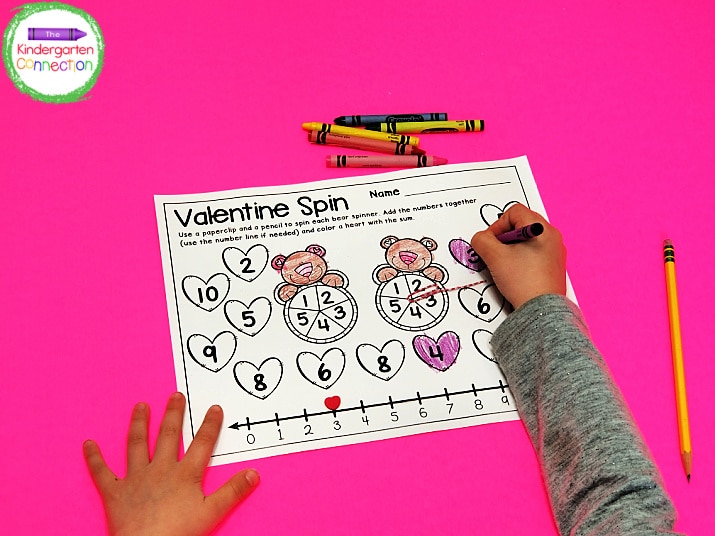 Once the students find the sum, they locate a heart with the correct answer and color it in.