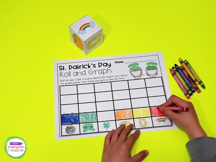 Print the roll and graph recording sheet, printable die, and grab your crayons for a fun math center!