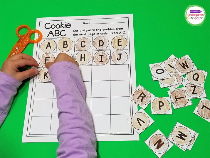 The kids cut apart the letters and glue them in the correct alphabetical order on the Cookie ABC activity sheet.
