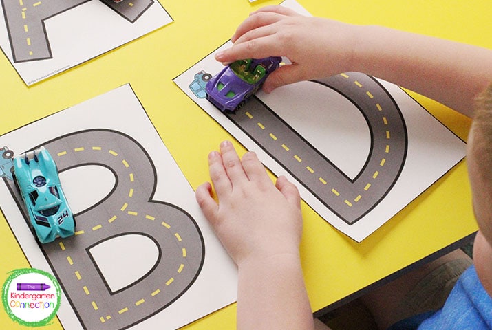 This resource pack includes interactive centers like this racecar letter tracing activity.
