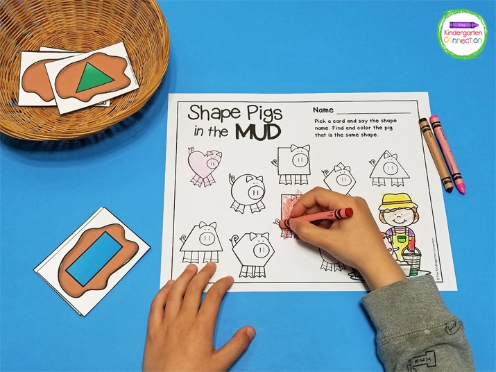 In Shape Pigs in the Mud, students pick a regular 2d shape card and match it to the pig shape on the recording sheet.