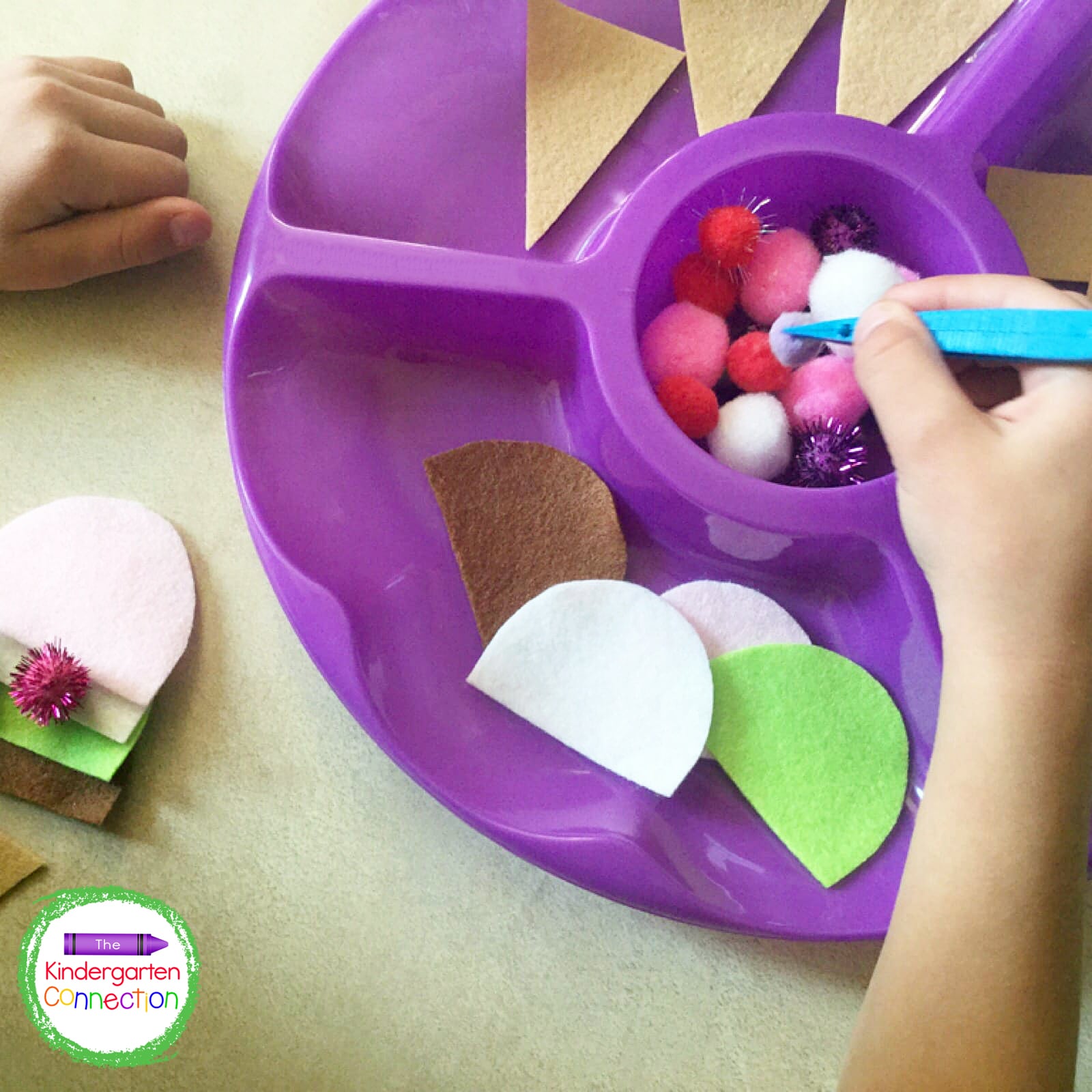 Give students plastic tweezers and they are all set to build their ice cream cones and practice fine motor skills.