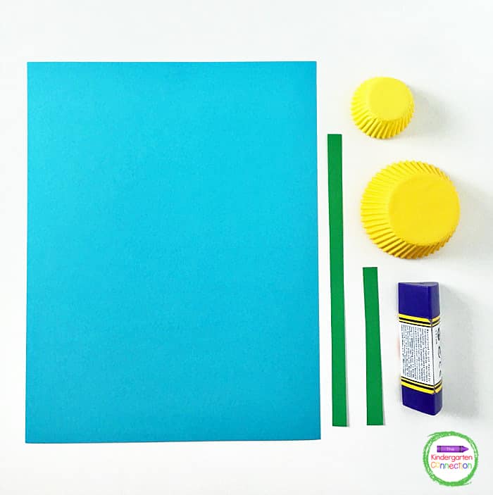 Grab some cupcake liners, blue and green cardstock, and a glue stick to make this simple spring craft.