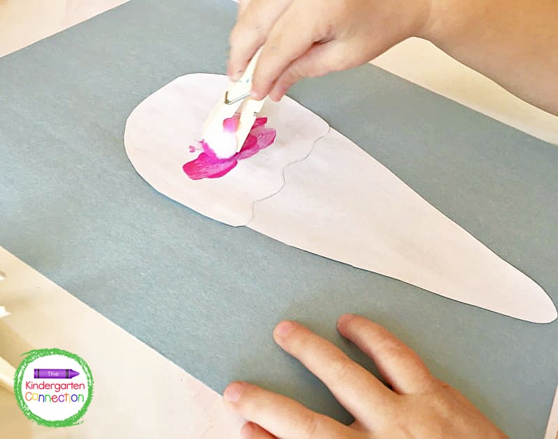 Glue the entire assembled cone to a second piece of paper to make painting easier for yournger children.
