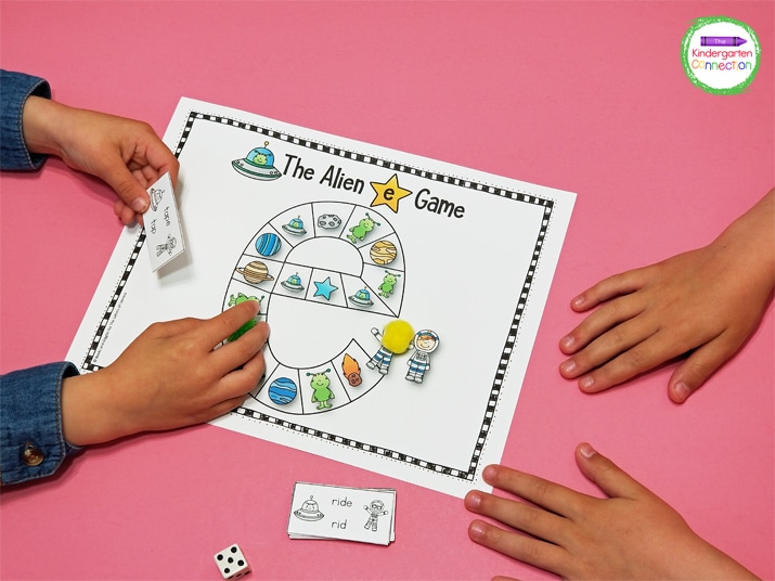 Kids read the CVC or CVCe word on the card pieces depending on the space they land on.