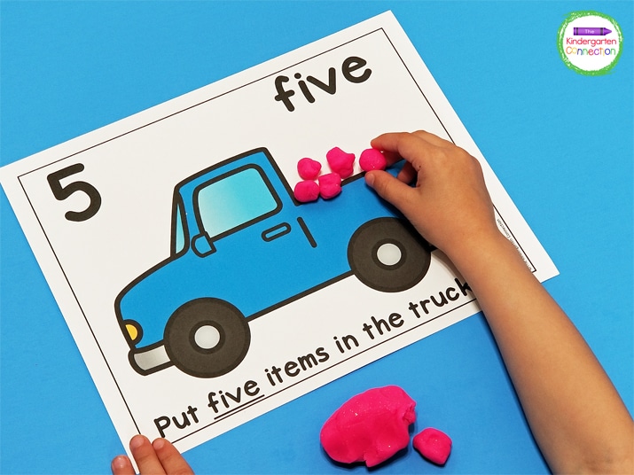 Students can read the number and number word on the counting mat and use their play dough to put that many items “in the truck.”