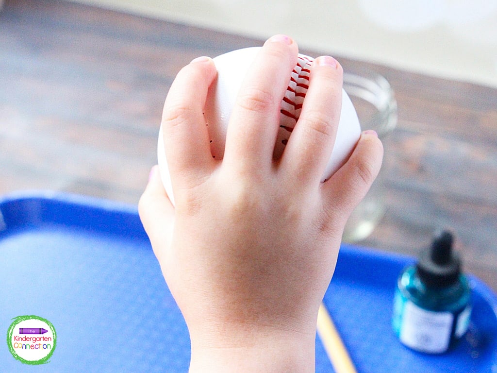 Have the children first practice positioning their hands on the baseball and carefully removing their hand without smudging.