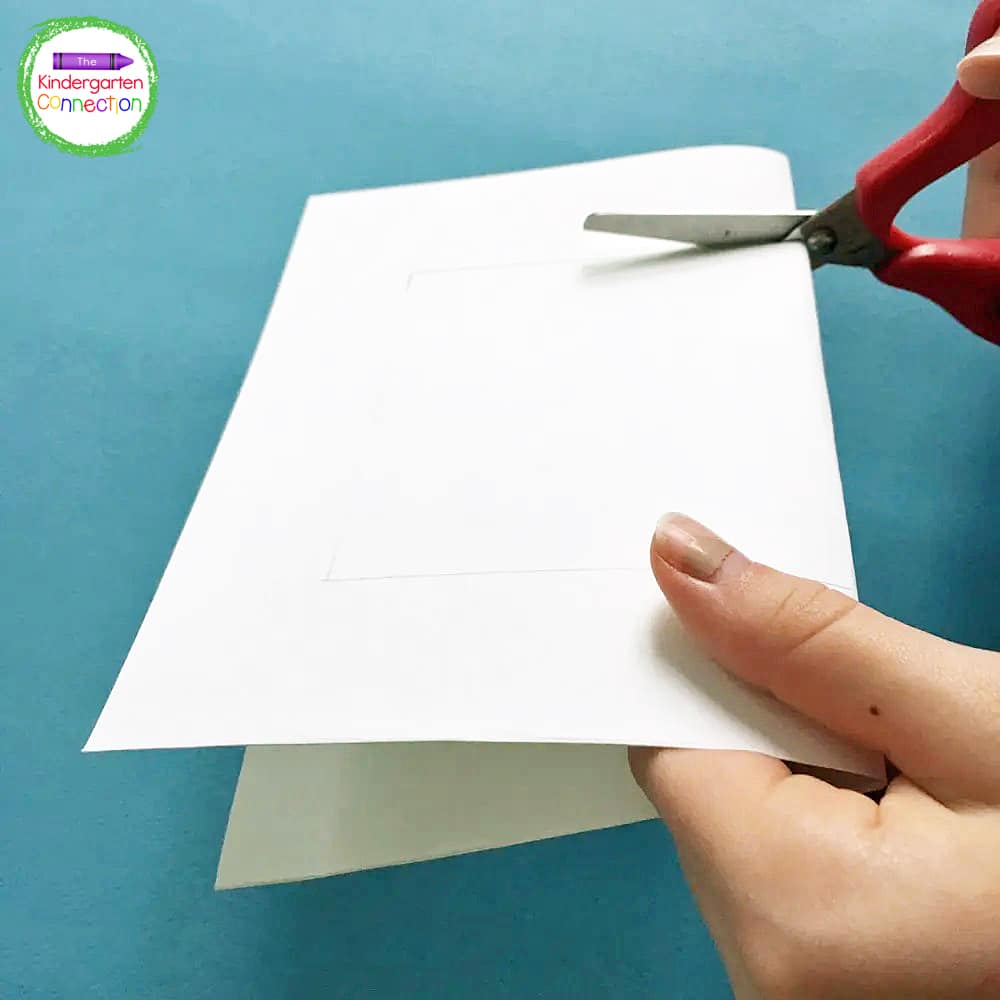 Have students cut out the center of the photo frame that has been traced ahead of time.