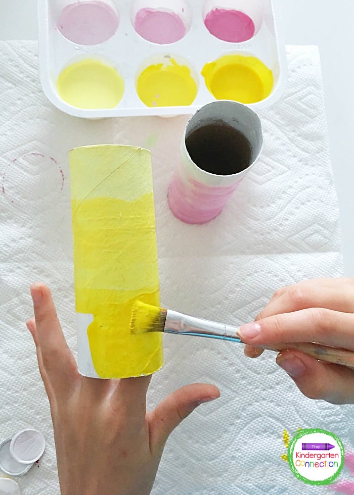 Invite your child to paint the cardboard tube in a single hue going from the lightest to the darkest color value.