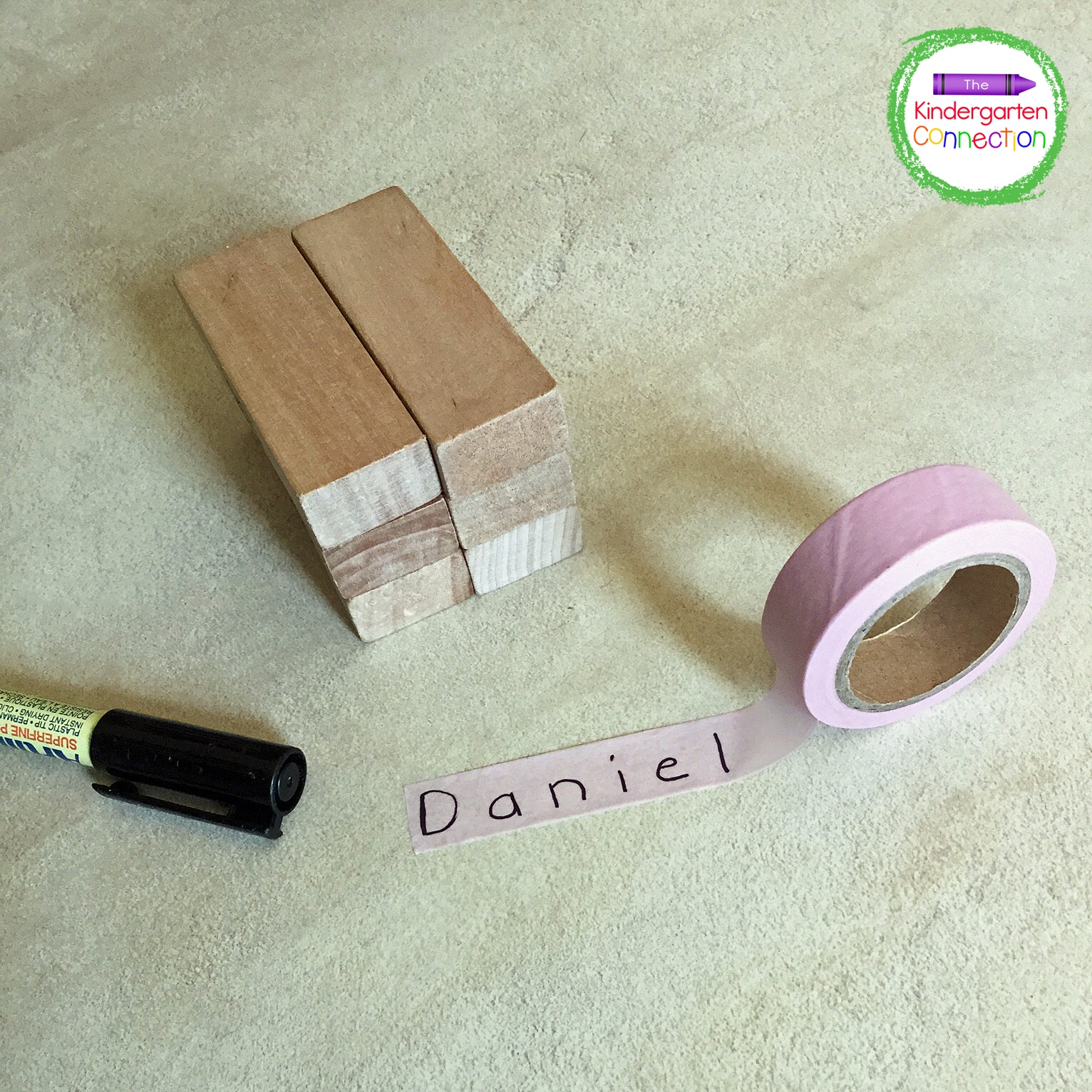 To start, write the name of each child on a piece of masking tape with a permanent marker.