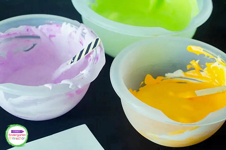 Add food coloring to each bowl to create fun colored puff paint.