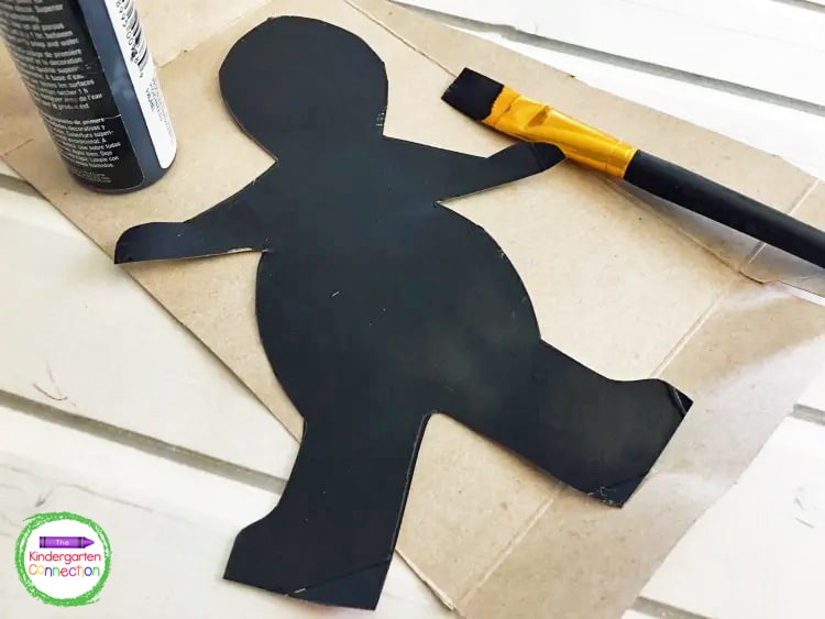 Then you will want to paint both sides of the cardboard cutout black and let it dry.