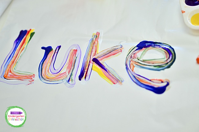 Kids can continue this name tracing activity using all of the colors of the rainbow to paint their names.