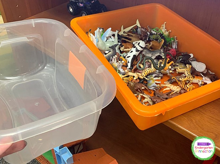 I swapped our toy animals into a clear storage bin instead of the orange container they were in to re-engage the students.