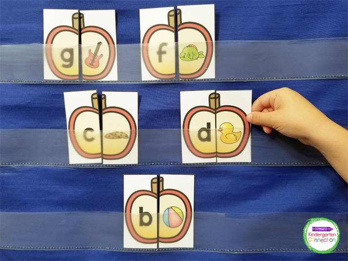 Students can pick a card, look at the picture, and isolate the beginning sound, matching the picture to the letter in the pocket chart.