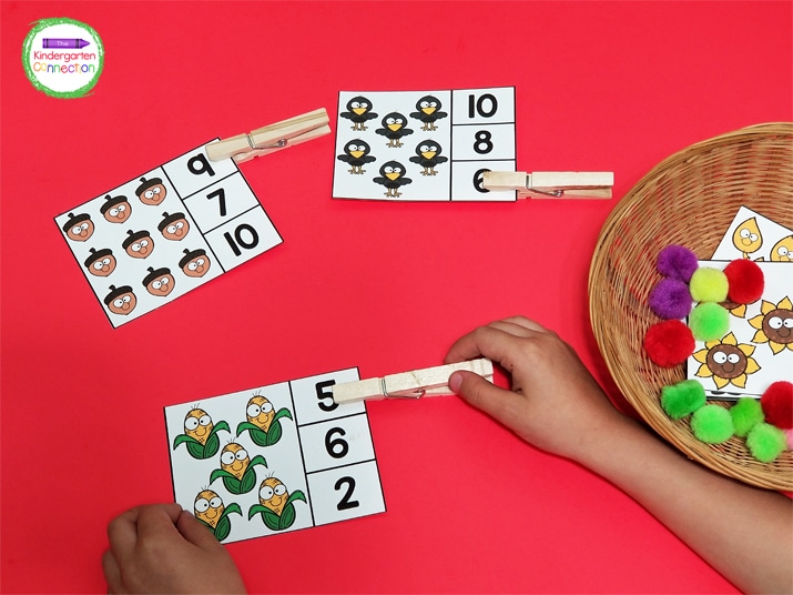Students count the number of fall items on the card and clip the correct corresponding number.