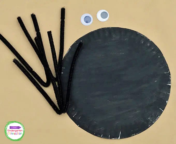 Grab some paint, paper plates, pipe cleaners, and googly eyes to make this cute paper plate spider craft.