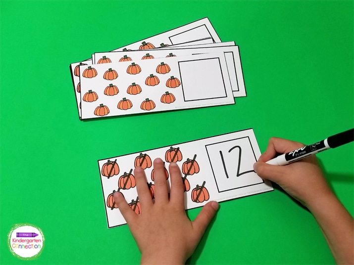 To play, students will pick a card and count the pumpkins one at a time. Then they write the correct number on the card.
