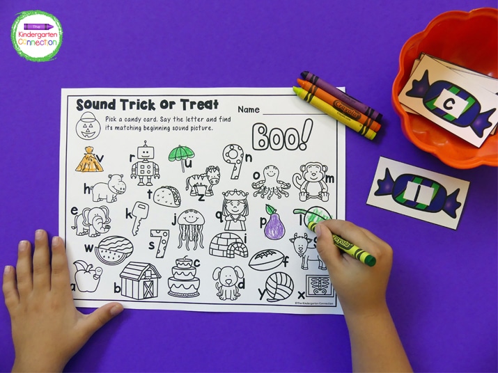 For this activity, kids pick an alphabet candy card, read the letter, and color the picture that starts with that sound.