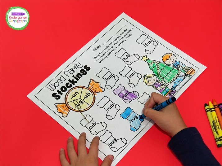 Students spin the spinner and color the corresponding word family on the printable.