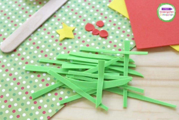 Begin by cutting green craft foam into strips. These strips should be cut in various sizes and lengths.