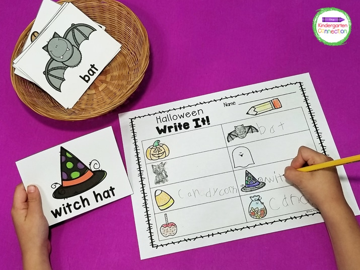 Students choose a vocabulary card and write the word on the "Halloween Write It!" recording sheet.