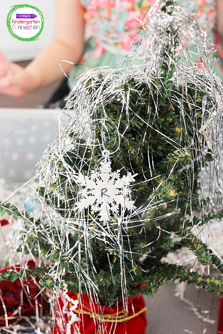 They can use the tinsel to decorate the Christmas tree.