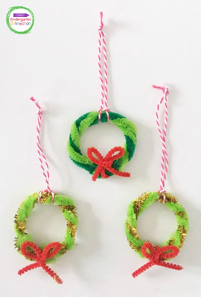 Once the wreath is complete, add the string to create a loop to hang your mini wreath ornament on the tree!