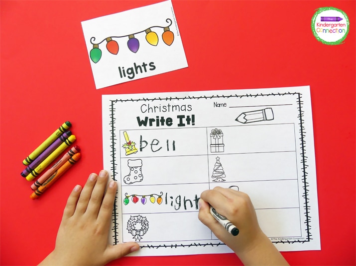 Students choose a vocabulary card and write the word on the "Christmas Write It!" recording sheet.