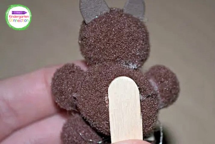 Glue a popsicle stick to the back side of your groundhog. Set him aside to dry.
