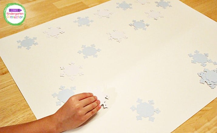 Grab your poster board then decide on the game board path for your snowflakes.