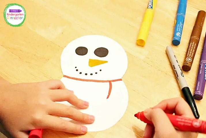 Draw a cute face on your snowman.