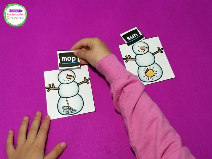 Once we had decoded the word for the picture, we gave that hat to its snowman for a perfect CVC word match!