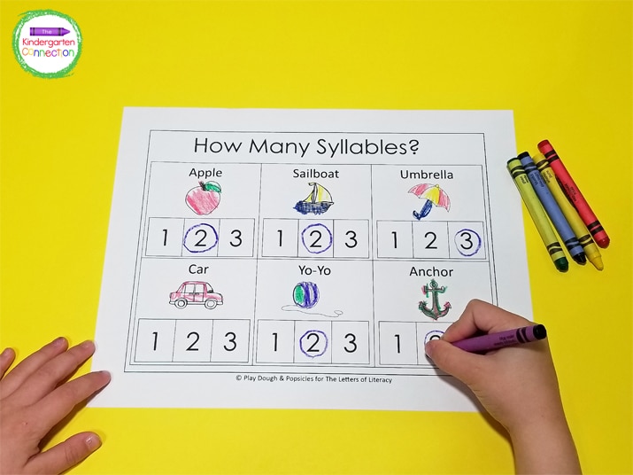 A crayon can be used to circle or color the number that corresponds with the number of syllables.