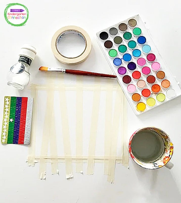 Grab some watercolors, tape, salt, and star stickers to make this fun winter watercolor scene!