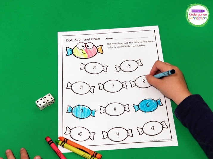 To play this addition game, students simply roll two dice, find the sum, and color.