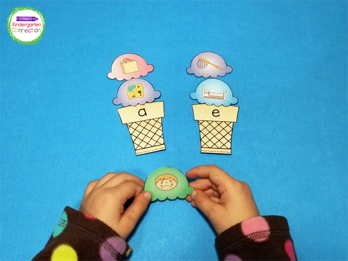 For a beginner version, include just a couple of ice cream cones and corresponding CVC word ice cream scoops.